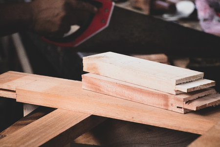 wood lumber from sawmill material in carpenter workshopの写真素材