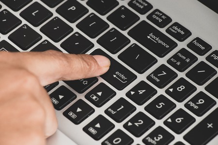 lady Hands typing on laptop keyboardの写真素材