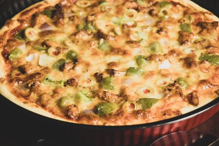 Pan Pizza take from very closeup and red panの写真素材