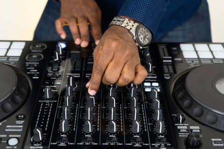 Dj mixes the track in the nightclub at partyの写真素材