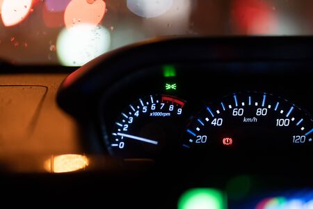 Modern car illuminated dashboard closeupの写真素材