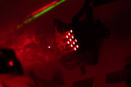 vintage theater spot light on black curtain with smokeの写真素材