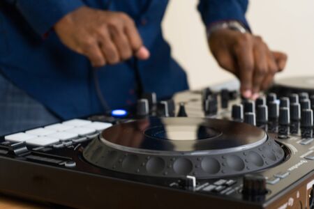 Dj mixes the track in the nightclub at partyの写真素材