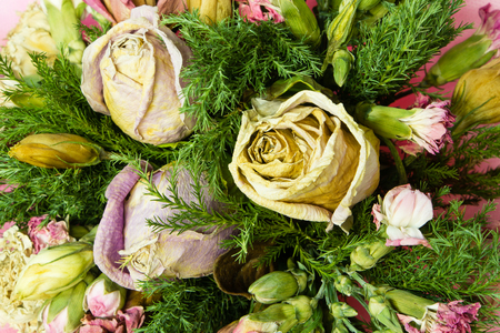 bouquet of dried withered rosesの写真素材