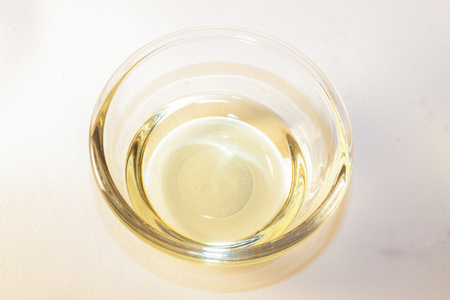 White wine vinegar, isolated on white backgroundの写真素材