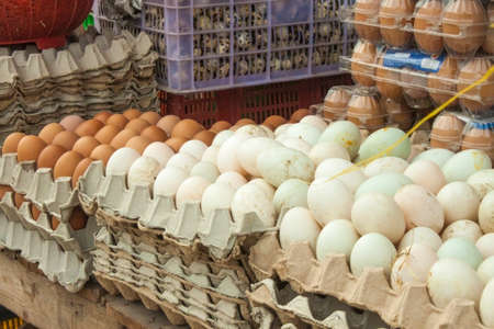 A lot of white and brown egg, at a market