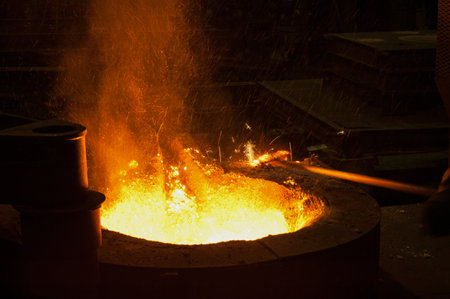 Metal smelting in the steel mills, closeup of photoの写真素材