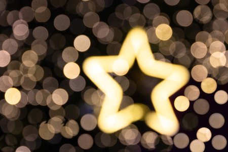 blurred christmas glittler star light for background,happy new year and Christmas holiday background