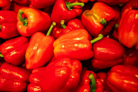 red bell peppers closeup backgroundの写真素材