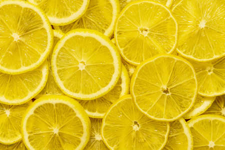 many of fresh lemons closeup wallpaperの写真素材