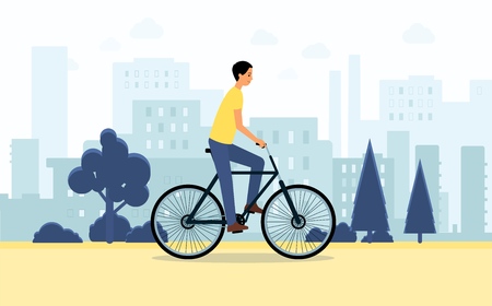 Young man riding bicycle through city, healthy lifestyle bike sport lover biking on cityscape...