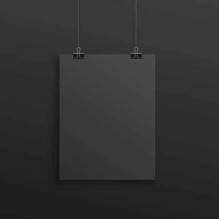 Black poster hanging with binder clips - realistic mockup on dark background. Blank A4 paper sheet with blank copy space - design display template, vector illustrationのイラスト素材