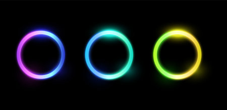 Vector neon glowing rings on black isolated background.のイラスト素材