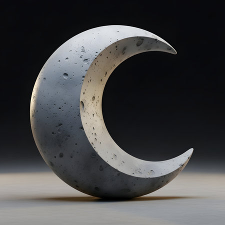 A close-up shot of a modern minimalist sculpture shaped like a crescent moon. The object is made of textured gray concrete and sits on a flat surface against a dark blurred background.の素材