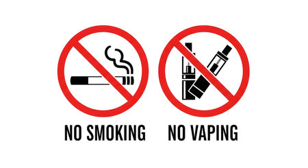 A set of two red prohibition signs for public spaces. One sign forbids smoking with a cigarette icon, and the other forbids vaping with an e-cigarette icon.の素材