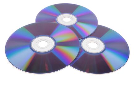 Three dvd disks over white