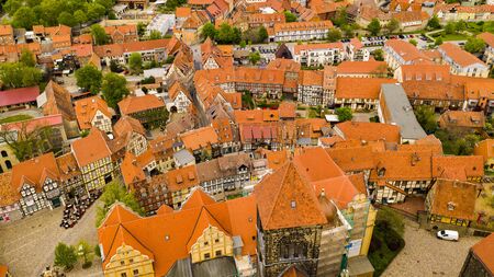 Quedlinburg, Harz, Germany, aerial view from above, drone shooting. Red roofs of half-timbered...