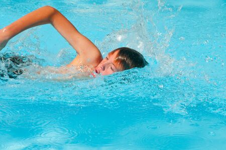 Young Swimmer training for a competition