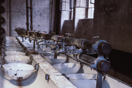 washing place for employees in old factoryの写真素材