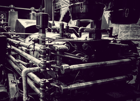 Machinery in old factory in black and whiteの写真素材