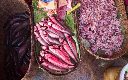 fish and frog legs on a market in siem reap in cambodiaの写真素材
