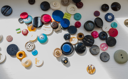 colorful pictures of Buttons in an old workshop