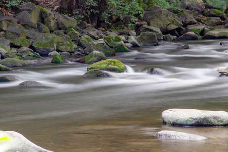 The Bode valley in Harz, Germany, was photographed with a tripod using a gray filter to give the...