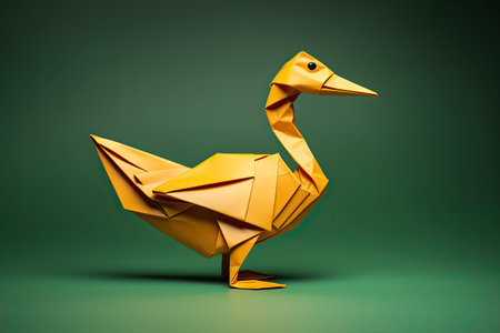 Paper origami duck on a green background. 3d rendering.の素材