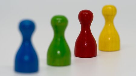 Pawns blue green red yellowの写真素材