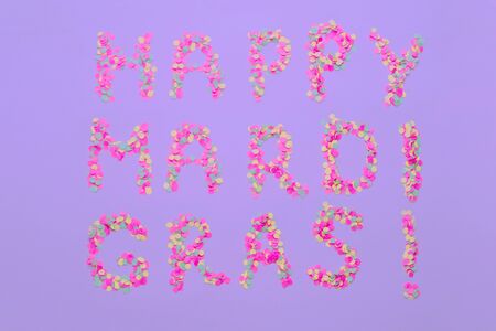 Inscription Mardi Gras from confetti. Mardi Gras. Holiday decoration cardsの写真素材