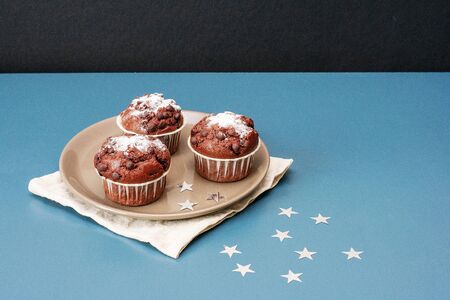 Festive dessert. Christmas chocolate cupcakes. Christmas sweets. New Year's dessertの写真素材