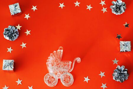 Baby carriage on a redの写真素材