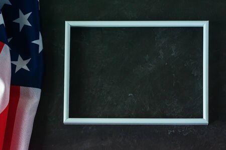 American flag on a black background. Memorial Day, Veterans Day, Labor Day. Place for textの写真素材