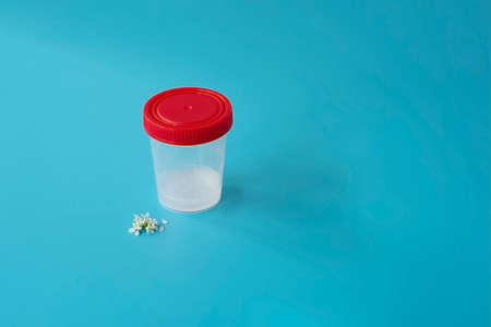 Sperm bank for artificial insemination, infertility treatment, child planning. Donor sperm on a blue background.の写真素材