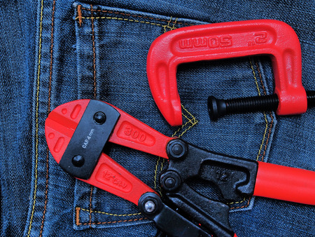 c-clamp and cutter on jeansの写真素材