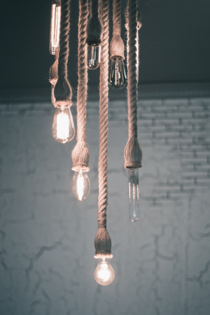 incandescent lamps on the harness hanging on the ceilingの写真素材