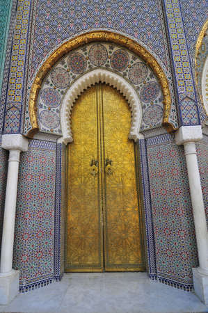 Golden carved door of a palace in Moroccoの写真素材