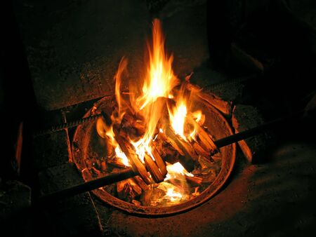 camp fire burnin in the darkness of nightの写真素材