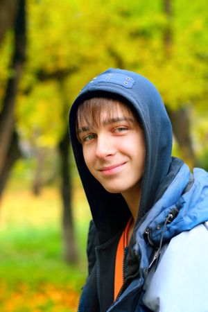teenager portrait in the autumn parkの写真素材
