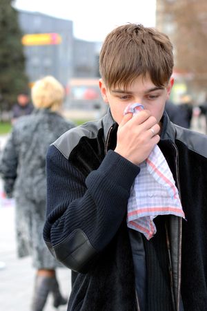 attack of the flu on the streetの写真素材