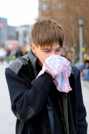 attack of the flu on the streetの写真素材