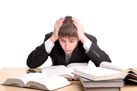 A teenager studying hard for the examの写真素材