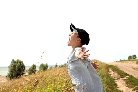 The happy child on the seasideの写真素材