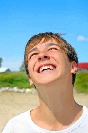 Happy teenager on the beachの写真素材