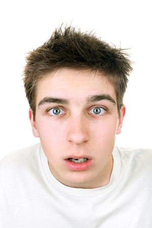 amazed young man isolated on the white backgroundの写真素材