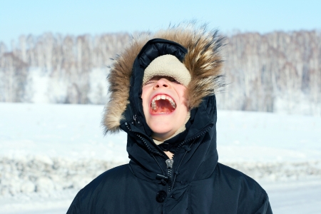 Portrait of Screaming Boy in the Winterの写真素材