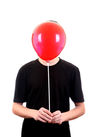 Person With Red Ball hide his face Isolated on the white backgroundの写真素材