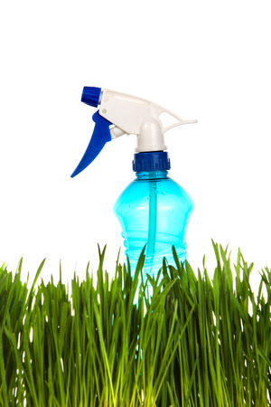Sprayer in the Grass Isolated on the White Backgroundの写真素材