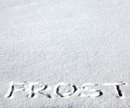 Handwritten Inscription Frost on the Snowの写真素材