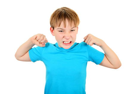 Angry Kid Muscle Flexing Isolated on the White Backgroundの写真素材